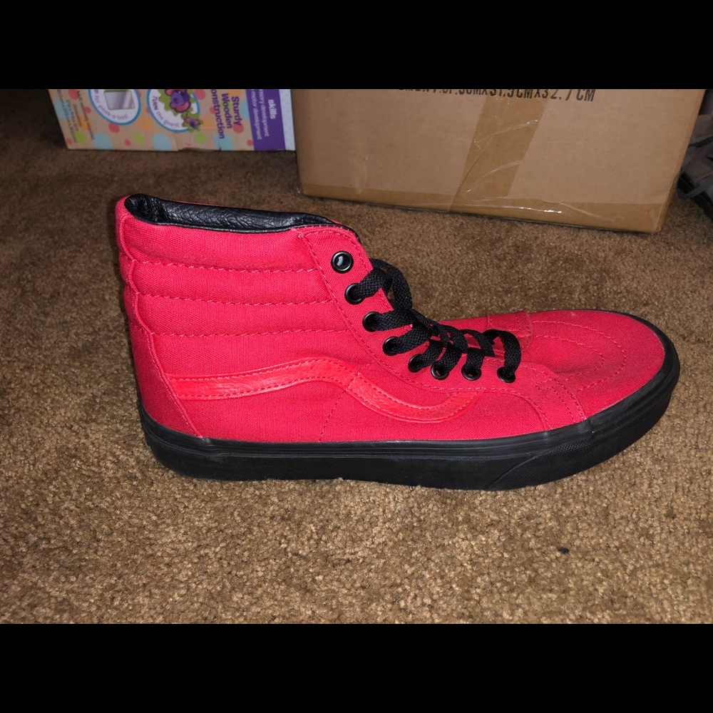 Red Vans.